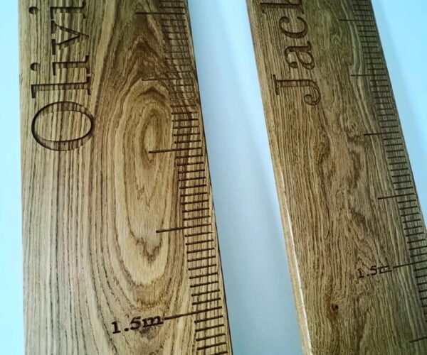 Pair of personalised solid oak height charts by Fuscina