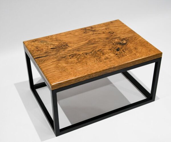 Bespoke Fuscina coffee table with brown oak top and steel legs in a home