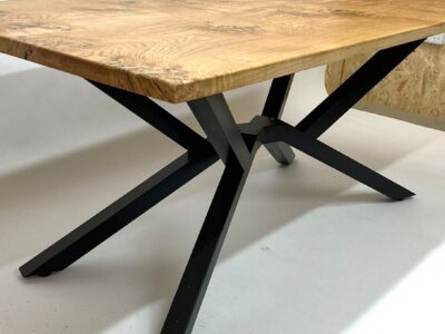 Bespoke steel spider table frame by Fuscina, angle view