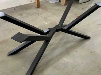Bespoke steel spider table frame by Fuscina, front view