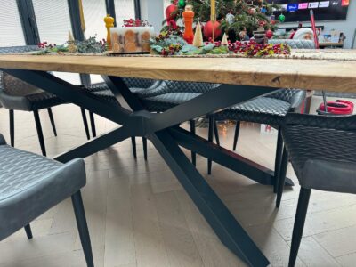 Bespoke spider steel frame table with oak top by Fuscina