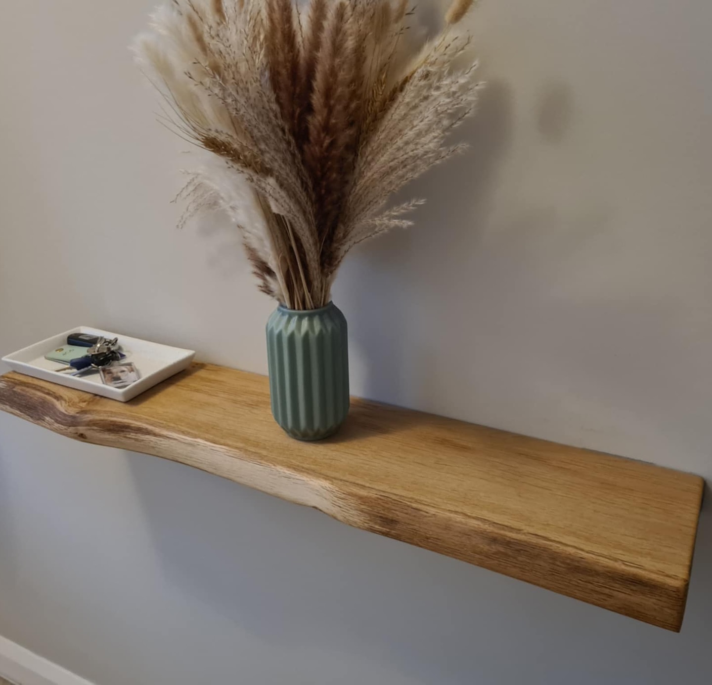 Bespoke Fuscina floating oak shelf with industrial steel bracket