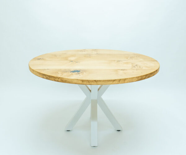 Rectangular oak coffee table with white steel legs at a full-length angle