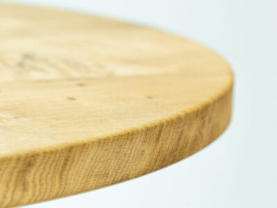 Close up of round oak coffee table