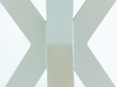 Close up of white table frame spider legs